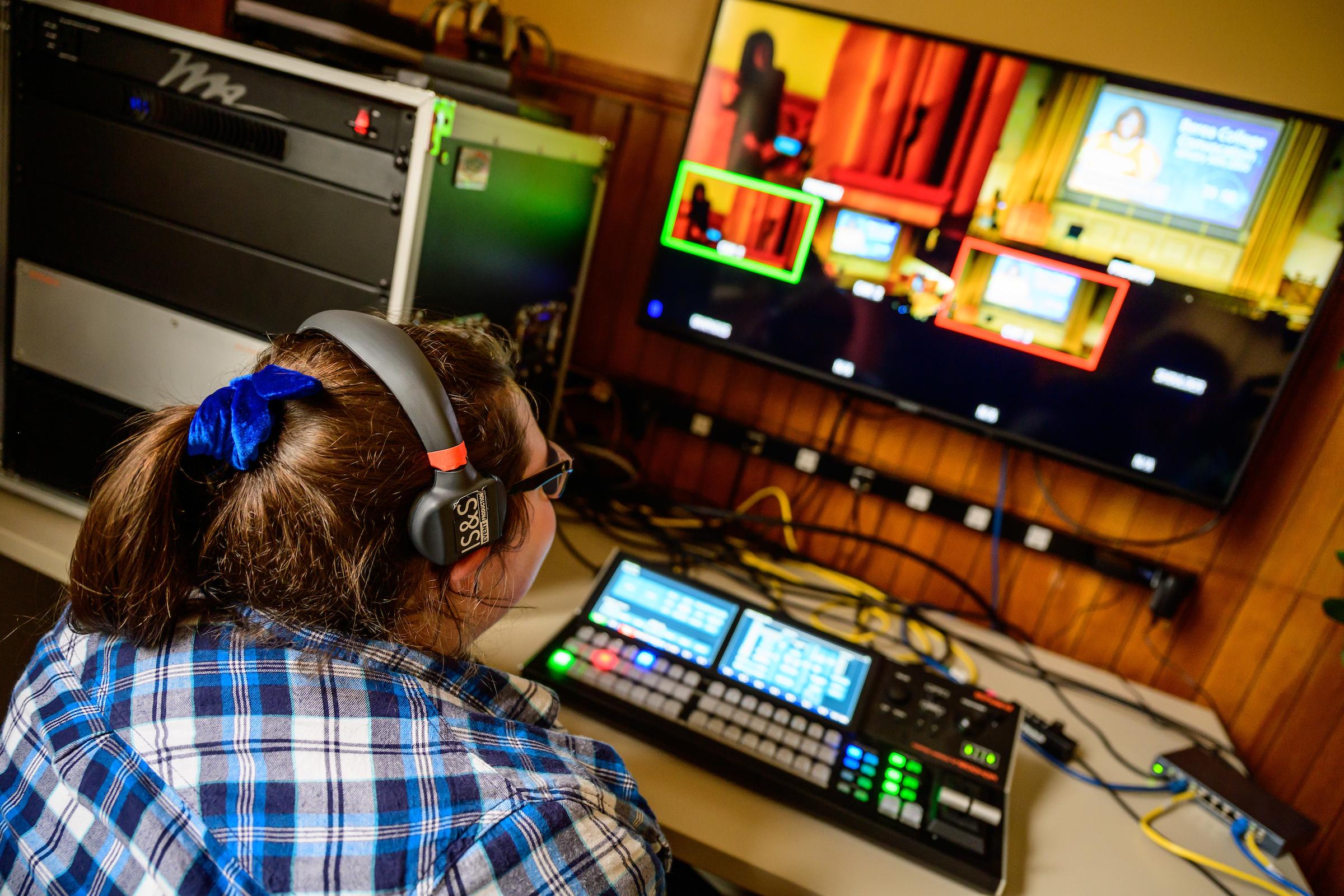 Audio/Visual labor student working a convocation